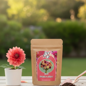 Engela Seeds flower seed mix in a kraft pouch on a table with a potted flower and soil beside it